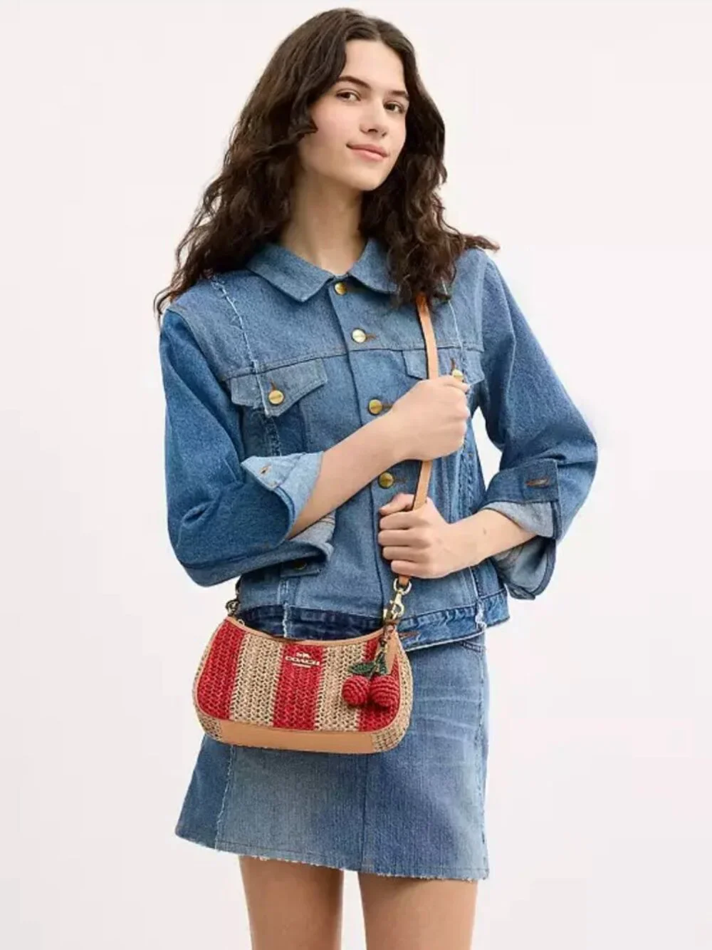 COACH teri shoulder bag with stripes and charm. gold/red/tan. item # cer34.